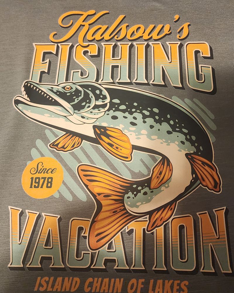 Gray V-neck tee with a full-color northern pike design reading 'Kalsow's Fishing Vacation, Island Chain of Lakes, since 1978'